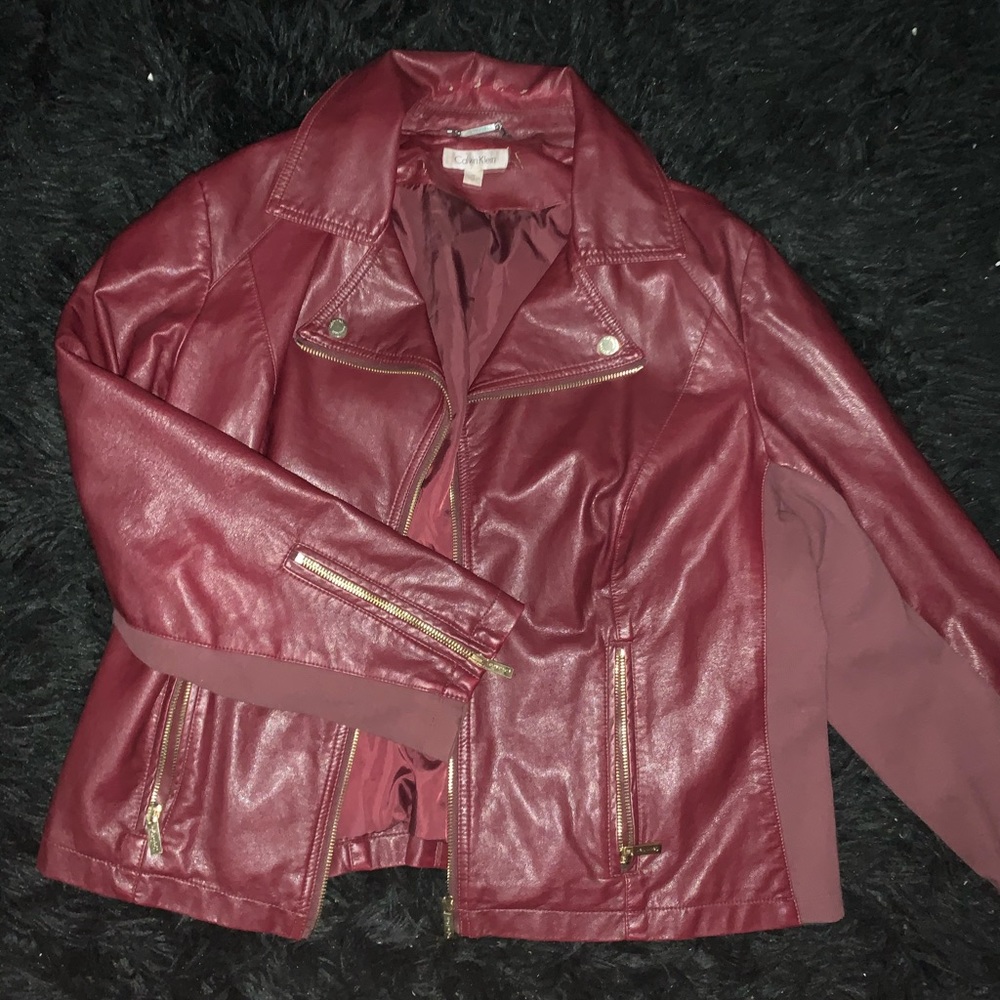 This is a Calvin Klein leather jacket (worn)